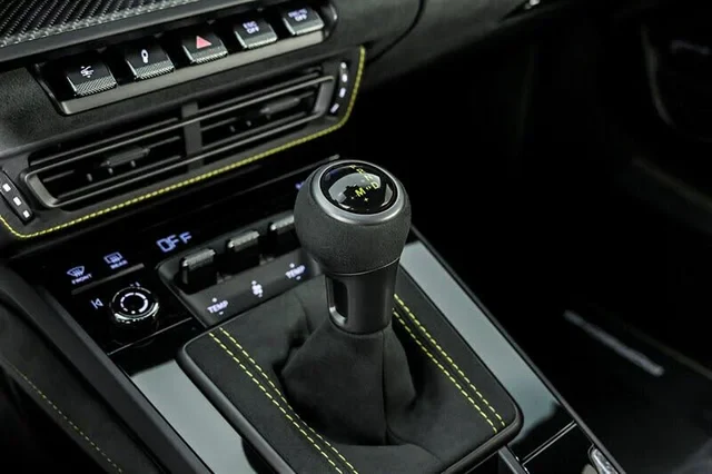 PDK selector in Race-Tex with yellow contrast stitching and carbon trim